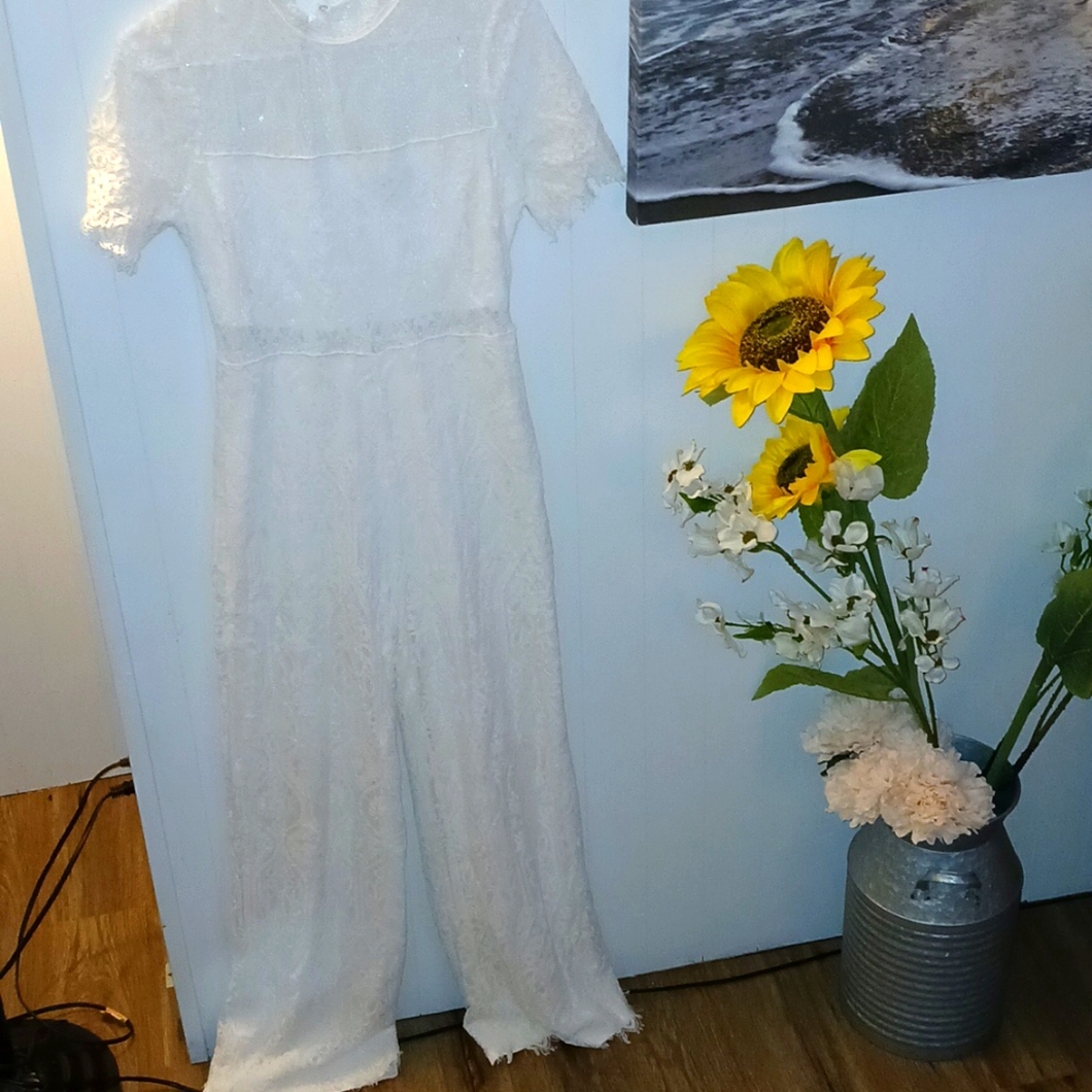 Lulus Beautiful lace jumpsuit.  Size medium.